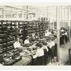 Manufacturing Colt's automatic pistols at Hartford, Connecticut. View of the inspection department. Stock room for rough parts. (4-1918)