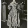 Costume, white brocade silk, pink and green design, worn by Mrs. Sarah Clarke, sister to Col. Timothy Pickering, 1730-1826. From Essex Inst.