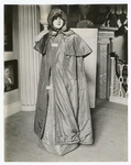 Costume, cloak, olive silk, worn by Mrs. Moses Adams, (Sarah Hubbard). Pumkin hood, quilted plum color silk, from Robbins family of Lexington, Mass.