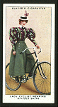 Lady cyclist wearing divided skirt.