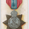 The Imperial Service medal.