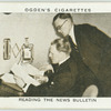 Reading the news bulletin.