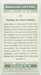 Reading the news bulletin.