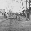 Ramshackle Negro houses, muddy street, no sidewalks, in Fulton