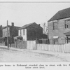 Negro homes in Richmond crowded close to street, with first floor below street level