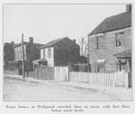 Negro homes in Richmond crowded close to street, with first floor below street level