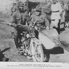 Both working for the Y.M.C.A.; Mr. Kelly and his colored driver at work during the last German offensive.