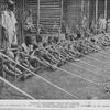 Negro children weaving cloth; Recently photographed in Kamerun, the last of the German province in Africa to surrender to the Allies; Illustrating child labor at the lowest possible cost.