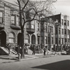 Old brown stonehouses now occupied by Negroes in Chicago, Illinois, April 1941.
