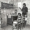 Negro mother teaching children numbers and alphabet in home of sharecropper, Transylvania, Louisiana, January 1939.