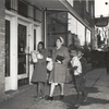 Wise Shoppers Start Home; The family starts home; To stretch their points they have bought fresh fruits and vegetables and more cereals than they used to eat; The boy and girl have been helpful to their mother because they've learned that rationing and price control help them get a fair share of scarce foods