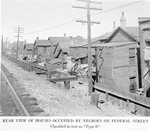 Rear view of houses occupied by Negroes on Federal Street