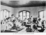 Girls learning to do repair work.