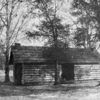 Evolution of the Negro home; Slave - cabins, Southern United States [loaned by Southern Workman]