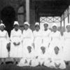 The Head Nurse at the public hospital with her Corps of Haitian Nurses.