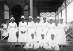 The Head Nurse at the public hospital with her Corps of Haitian Nurses.