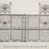 Decorative metalwork grille and fence with medallions.