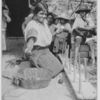 The Guatemalan women are particularly adept at handicraft such as weaving the cloth for their bright-coloured garments and making the fibre of the maguey hemp into ropes and hammocks.