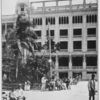 The heart of the old city of Santiago is the plaza, upon which faces the large modern hotel built and operated by the company that owns the principal railway lines of eastern Cuba.