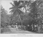 The road to market : A typical highway of Jamaica, followed by natives going to Kingston.