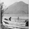 In their settings of towering mountains lie the gem-like lakes of Guatemala. The larger ones are now navigated by steamers as well as by the dugout canoes of the Indians.
