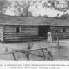 A Negro's log cabin [thoroughly comfortable and tastefully furnished inside], Alabama.