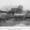 Loading waggons with cotton grown by Negro farmers at Mound Bayou, Mississippi.