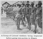 A group of Colored soldiers being inspected before going into action in Alsace.