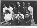 A group of teachers in the Utica Normal and Industrial Institute who were trained at Tuskegee Normal and Industrial Institute.