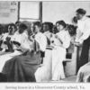 Sewing lesson in a Gloucester County school, Va.