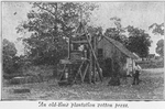 An old - time plantation cotton press.