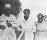 Some of my informants; [Note the "mojo" around the neck of the center figure.]