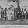 C. S. Smith and his adopted family of Dwalla Children