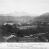 View of Public Square, Fort-de-France. Head of the statue of Josephine just visible over the avenues of tamarind trees. "Montant Peelee" [Mount Pelée] in the distance, 4000 feet high.