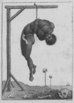 A negro hung alive by the ribs to a gallows