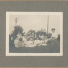 Highbridge, Exterior, librarian and children on grass looking at camera