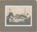 Highbridge, Exterior, librarian and children on grass looking at camera