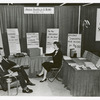 Library for the Blind, Exhibit Booth, American Libraries Association, San Francisco, CA. Left to right are: Mr. Charles Gallozzi, Assistant Chief, Division for the blind; Mr. Robert S. Bray, Chief, Division for the Blind; Miss Helga Leude, Librarian, American Foundation for the Blind