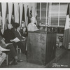 Mosholu] Isabel Jackson [speaking], Bronx Coordinator, [behind, seated] Mrs. Currie, Branch Librarian