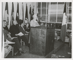 Mosholu] Isabel Jackson [speaking], Bronx Coordinator, [behind, seated] Mrs. Currie, Branch Librarian