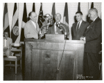 Mosholu, (left) Zurmuhlen, (middle, speaker) Deputy Mayor Epstein] E.G. Freehafer [second from left, next to unidentified man]