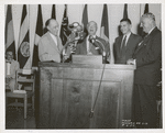 Mosholu, (left) Zurmuhlen, (middle, speaker) Deputy Mayor Epstein] E.G. Freehafer [second from left, next to unidentified man]