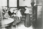 Seward Park Students pictured at depleted American History shelf