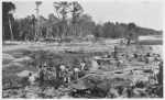New Hanover county prisoners preparing road materials. No stripes or chains are used.