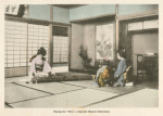 Playing the 'Koto', a Japanese Musical Instrument.