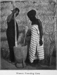 Women pounding corn.