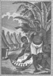 Two females, one pointing away with a child on her arm and looking at female kneeling down using a instrument with holes