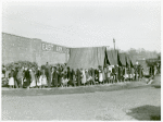 Negro flood refugees lined up and waiting for food in Forrest City, Arkansas camp; Feb. 1937.