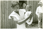 Wife and children of a Negro tenant farmer, Tupelo, Miss., Aug. 1935.