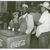 Mexican and negro cotton pickers inside plantation store, Knowlton Plantation, Perthshire, Miss. Delta. This transient labor is contracted for and brought in trucks from Texas each season. October 1939.